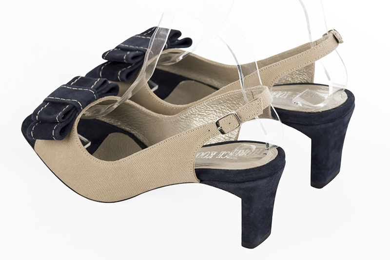 Tan beige and navy blue women's slingback sandals. Square toe. Medium comma heels. Rear view - Florence KOOIJMAN